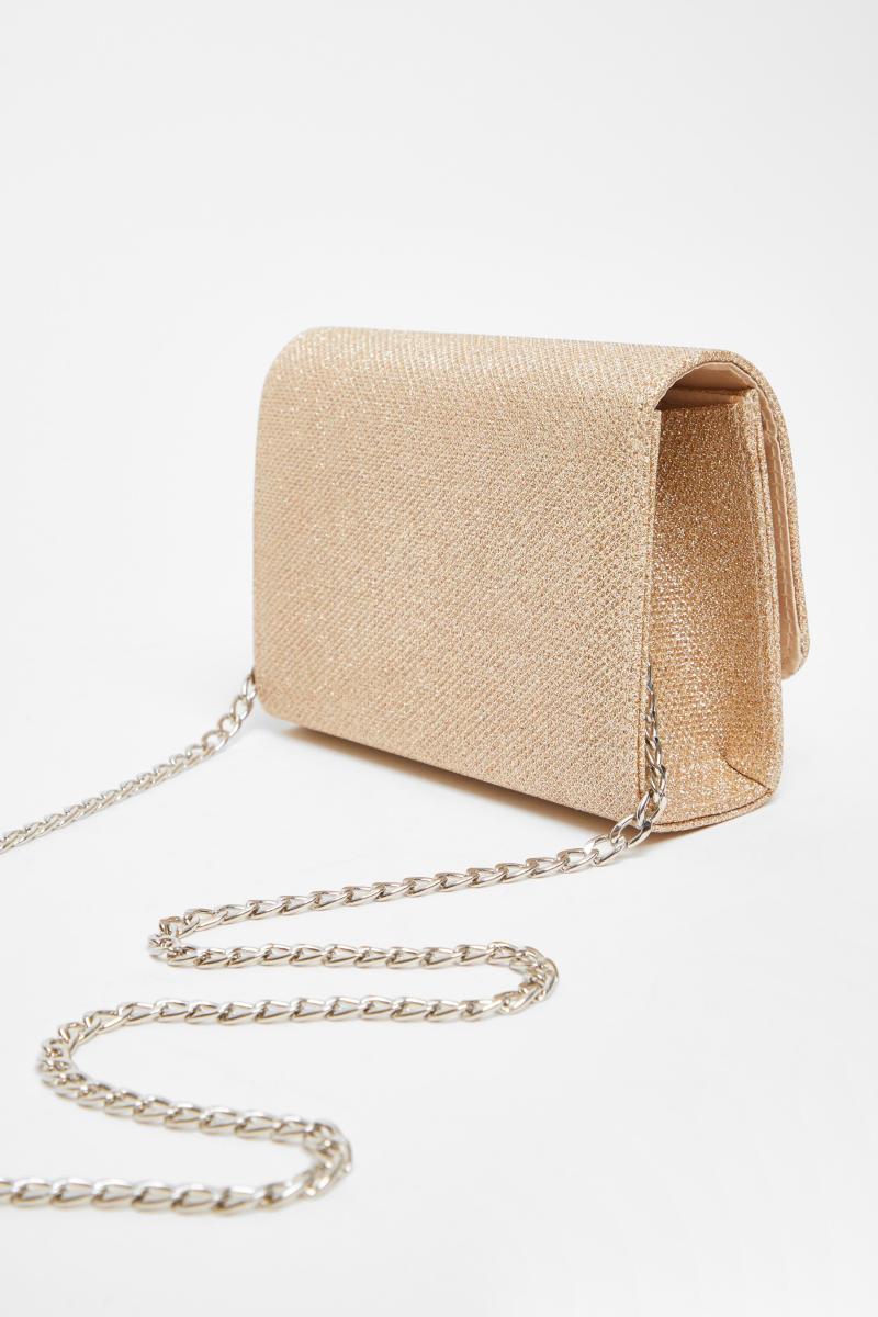 Золотий мерехтливий мішок зчеплення