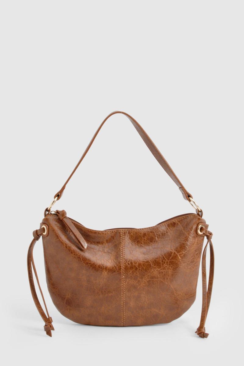 Накладена шкіряна щітна сумка