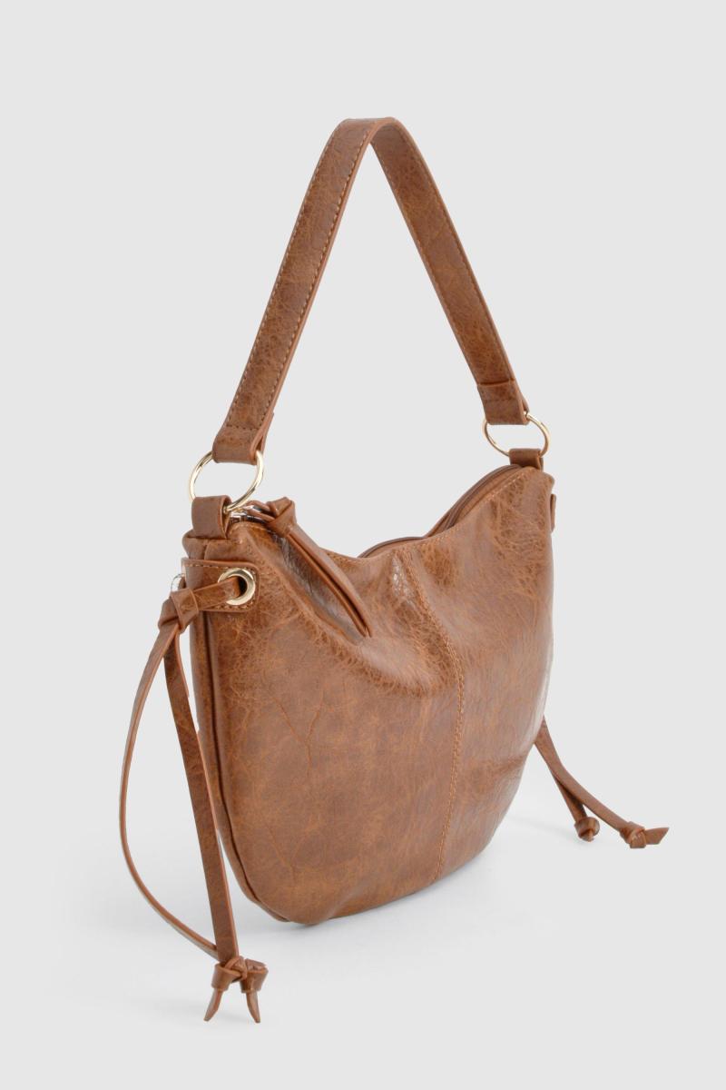 Накладена шкіряна щітна сумка