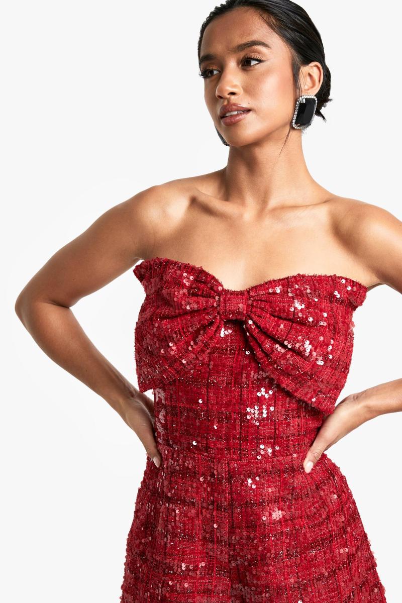 Маленький комбінезон з паєтками та бантом з букле