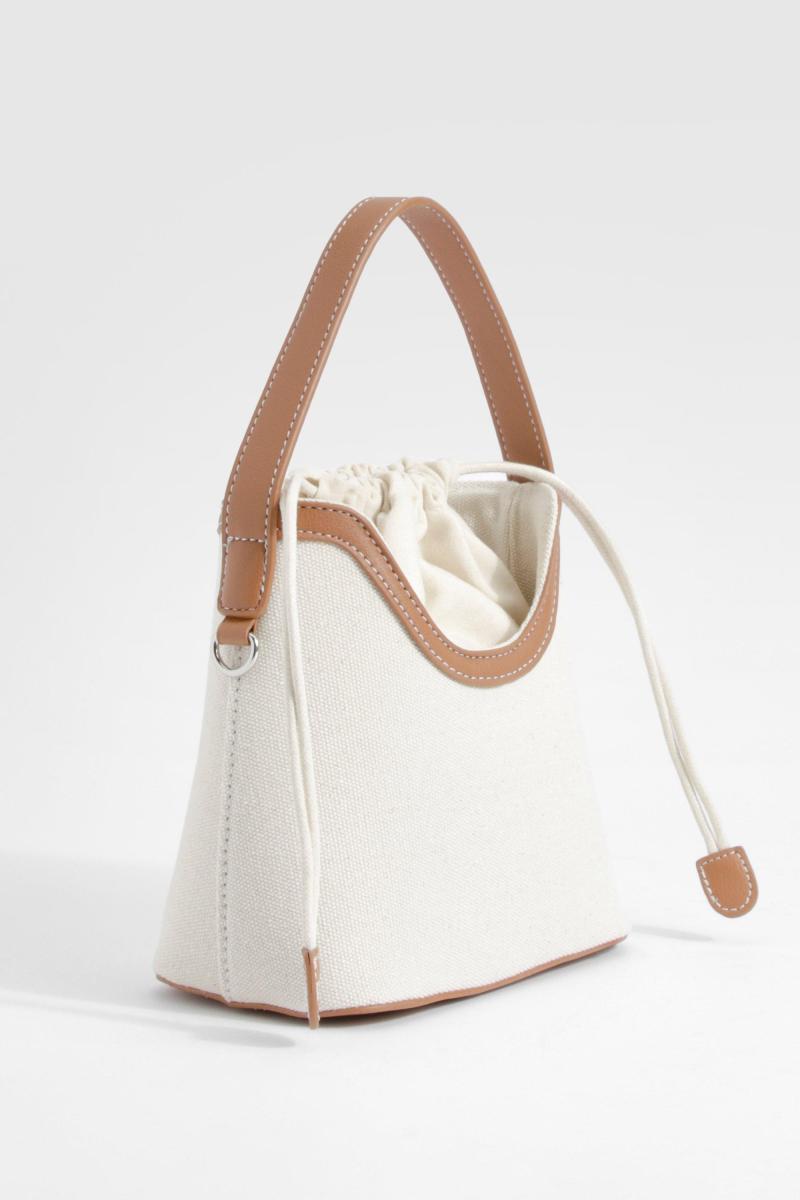 Контрастна міні-сумка з полотняних деталей